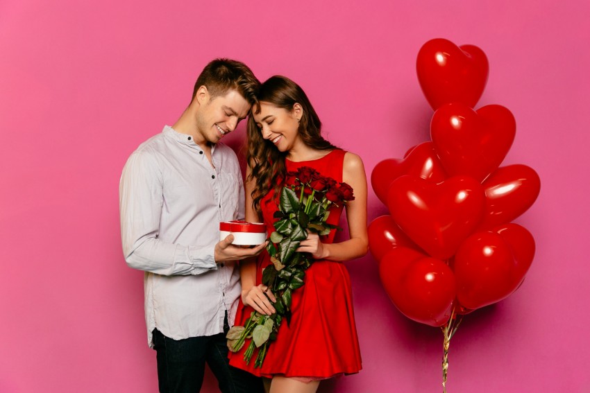 Romantic Couple With Red Rose